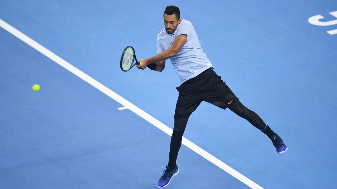 Nick Kyrgios of Australia hits a return during the men's singles final against Rafael Nadal of Spain at the China Open tennis tournament in Beijing on October 8, 2017. (AFP)