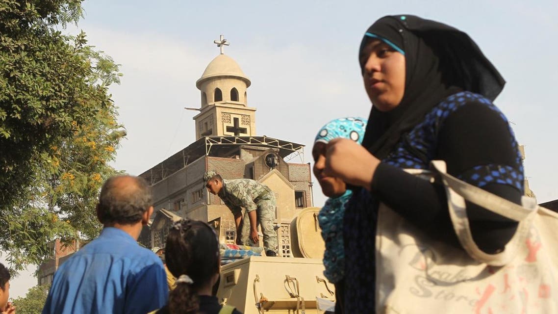 Egyptian military and riot police guard the Virgin Mary church in the popular area of Imbaba in the Egyptian capital of Cairo. (File photo: AFP)