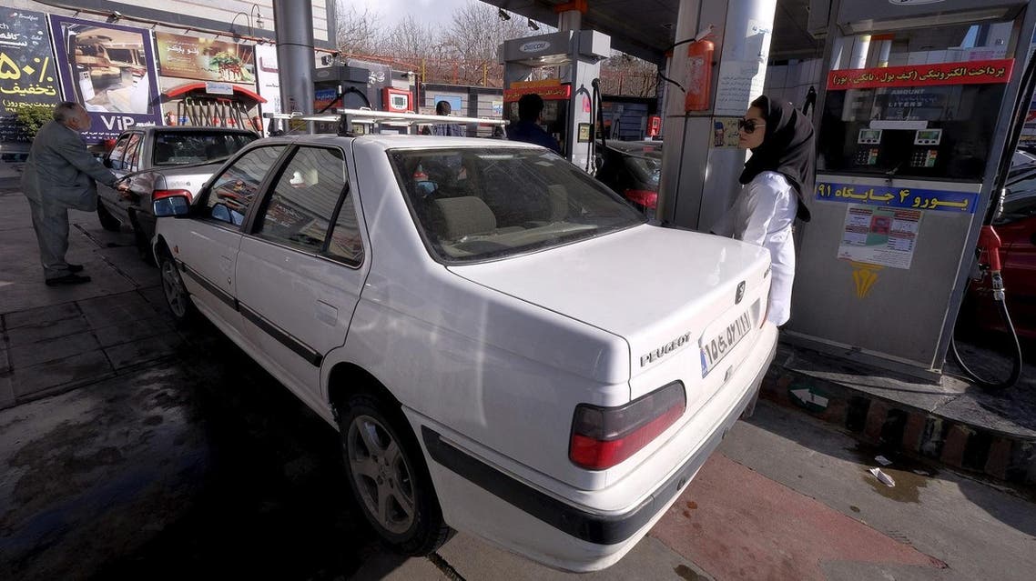 Iranians fill up their cars with fuel at a petrol station in Tehran, Iran, January 25, 2016. (Reuters)