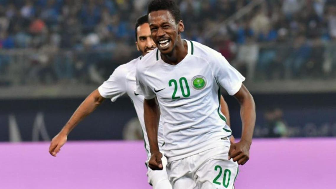 Saudi Arabia’s Mukhtar Fallatah celebrates after scoring during the 2017 Gulf Cup of Nations football match between Saudi Arabia and Kuwait at the Sheikh Jaber Al-Ahmad Stadium in Kuwait City on Friday. — AFP