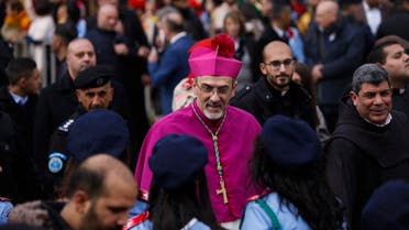 The Latin Patriarch of Jerusalem Pierbattista Pizzaballa arrives to the Church of the Nativity, built atop the site where Christians believe Jesus Christ was born, on Christmas Eve, in the West Bank City of Bethlehem, Sunday, Dec. 24, 2017. (AP)