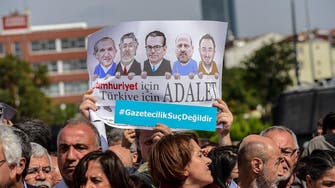 Turkish court keeps opposition newspaper staff in jail during trial