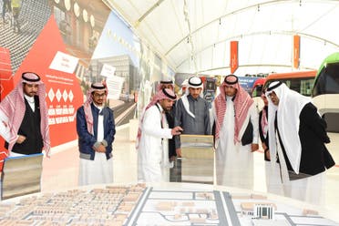 Visitors to the exhibition can also play virtual reality games by moving tablets across the huge map of Riyadh and move metros. (Supplied) 