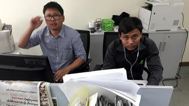 Reuters journalists Wa Lone (L) and Kyaw Soe Oo, who are based in Myanmar, pose for a picture at the Reuters office in Yangon, Myanmar December 11, 2017. (Reuters)