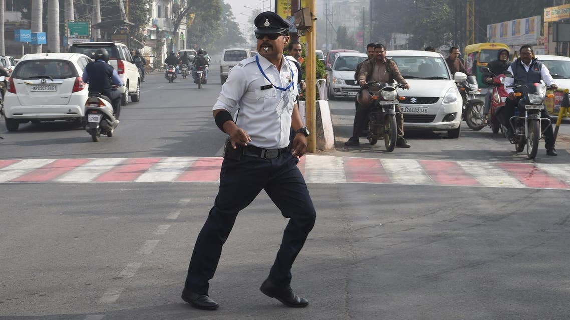 Ranjeet Singh directs traffic while ‘moonwalking’ at an intersection in Indore on December 22, 2017. (AFP)