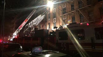 Apartment fire kills 12 in New York, four injured