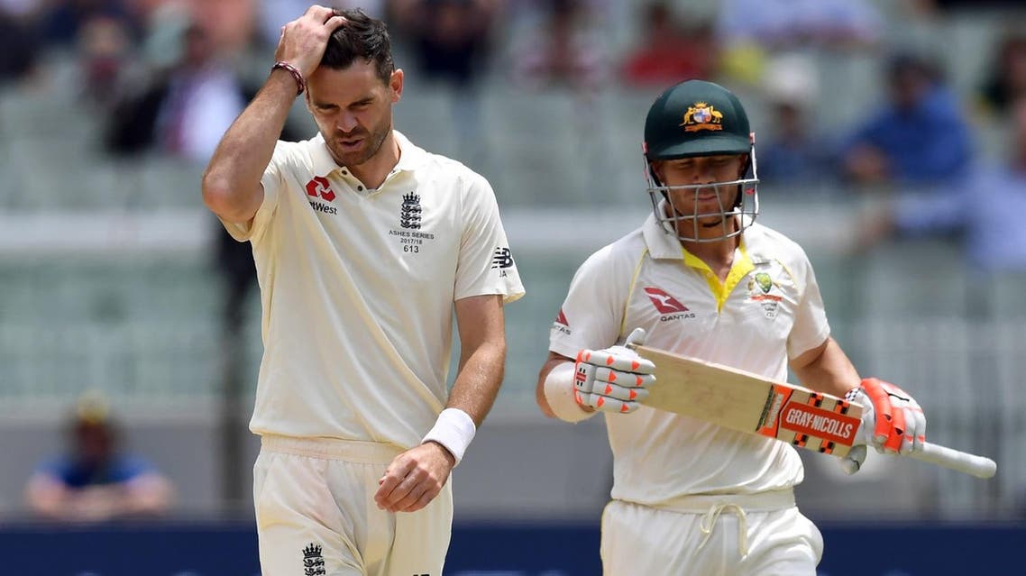 England’s paceman James Anderson (left) reacts after bowling a delivery to Australian batsman David Warner (R) on the fourth day of the fourth Ashes cricket Test match at the MCG in Melbourne on December 29, 2017. (AFP)