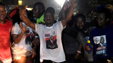 People celebrate the victory of George Weah in Liberia’s presidential run-off, on December 28, 2017 in Monrovia. (AFP)