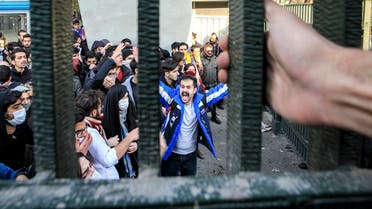 University students attend an anti-government protest inside Tehran University, in Tehran, Iran. (AP)