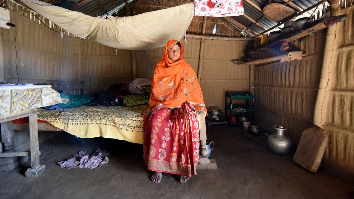 Marzina Bibi inside her house in Fofonga village in Goalpara district in the state of Assam on January 2, 2018. (Reuters)