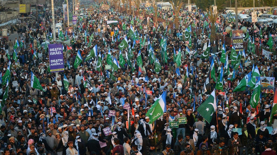 Activists of Jamaat-e-Islami Pakistan gather during an anti-US and anti-Israel protest rally in Karachi on December 17, 2017. (AFP)