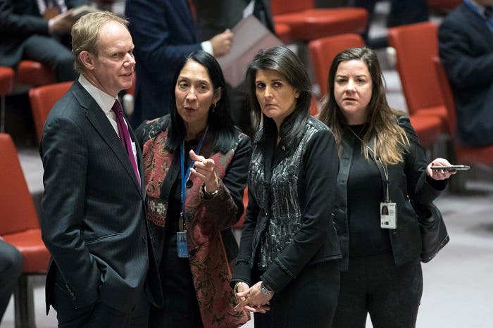 British Ambassador to the United Nations Matthew Rycroft, left, speaks to American Ambassador to the United Nations Nikki Haley before the start of a Security Council meeting on the situation in Iran, Friday, Jan. 5, 2018 at United Nations headquarters. (AP)