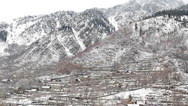 General view of snow covered houses after a snowfall on the outskirts of Srinagar on December 13, 2017. (AFP)