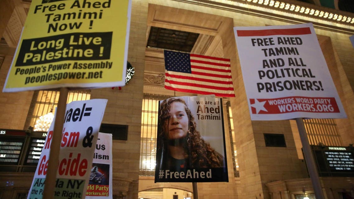 People rally in support of detained Palestinian teen Ahed Tamimi during a demonstration in Grand Central Terminal in Manhattan, New York, U.S. January 5, 2018. (Reuters)