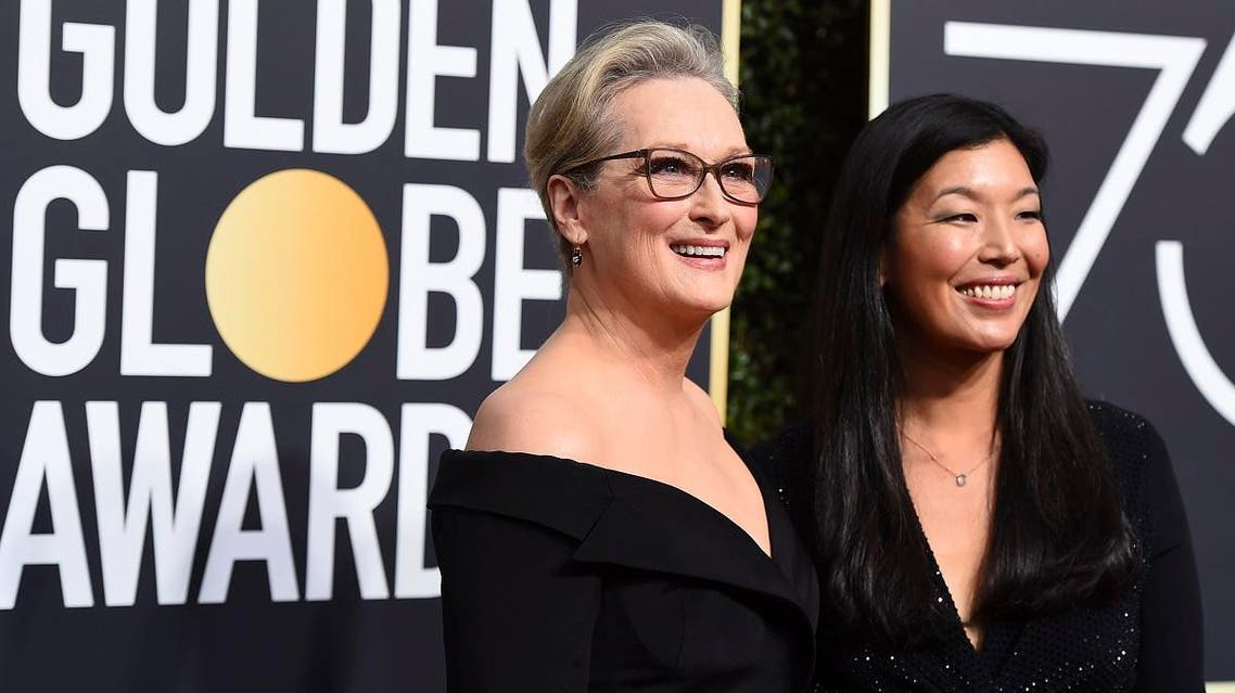 Meryl Streep, left, and Ai-jen Poo arrive at the 75th annual Golden Globe Awards at the Beverly Hilton Hotel on Sunday, Jan. 7, 2018, in Beverly Hills, Calif. (AP)