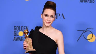 Rachel Brosnahan poses in the press room with the award for best performance by an actress in a television series - musical or comedy for "The Marvelous Mrs. Maisel". (AP)