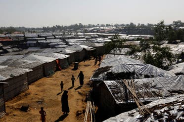 Rohingya refugees walk inside Kutupalong refugee camp near Cox’s Bazar, Bangladesh January 8, 2018. (Reuters)