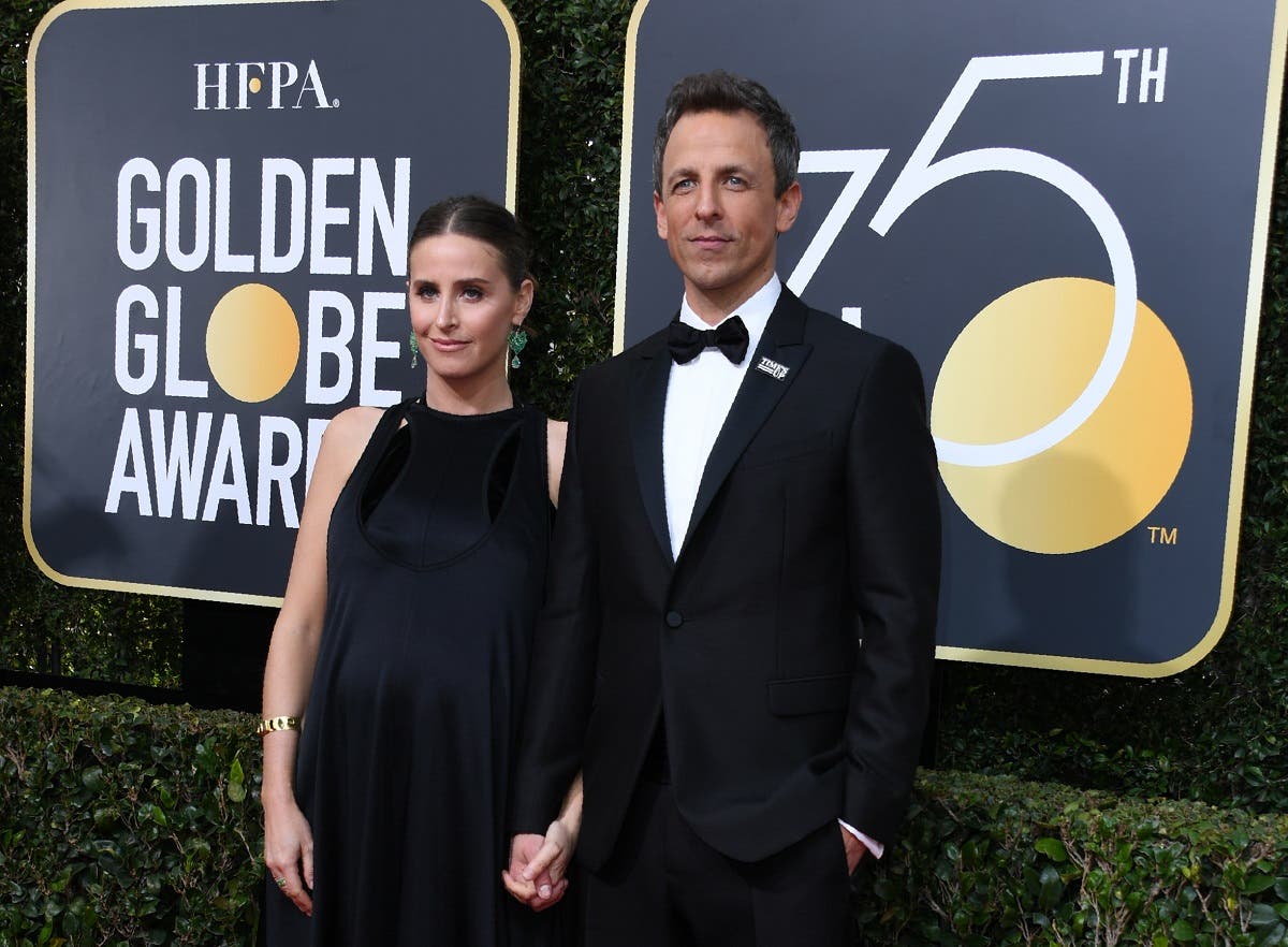 Seth Meyers and Alexi Ashe arrive for the 75th Golden Globe Awards. (AFP)