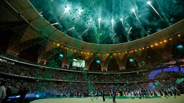 Fireworks illuminate the night sky during inaugural ceremonies for the new Jewel football stadium at the King Abdullah bin Abdelaziz sport city in Jeddah, Saudi Arabia on May 1, 2014. The 60,000-seat stadium hosted the final of the King Abdullah Cup between Al Shabab and Al Ahli football teams. AFP PHOTO/STR STR / AFP