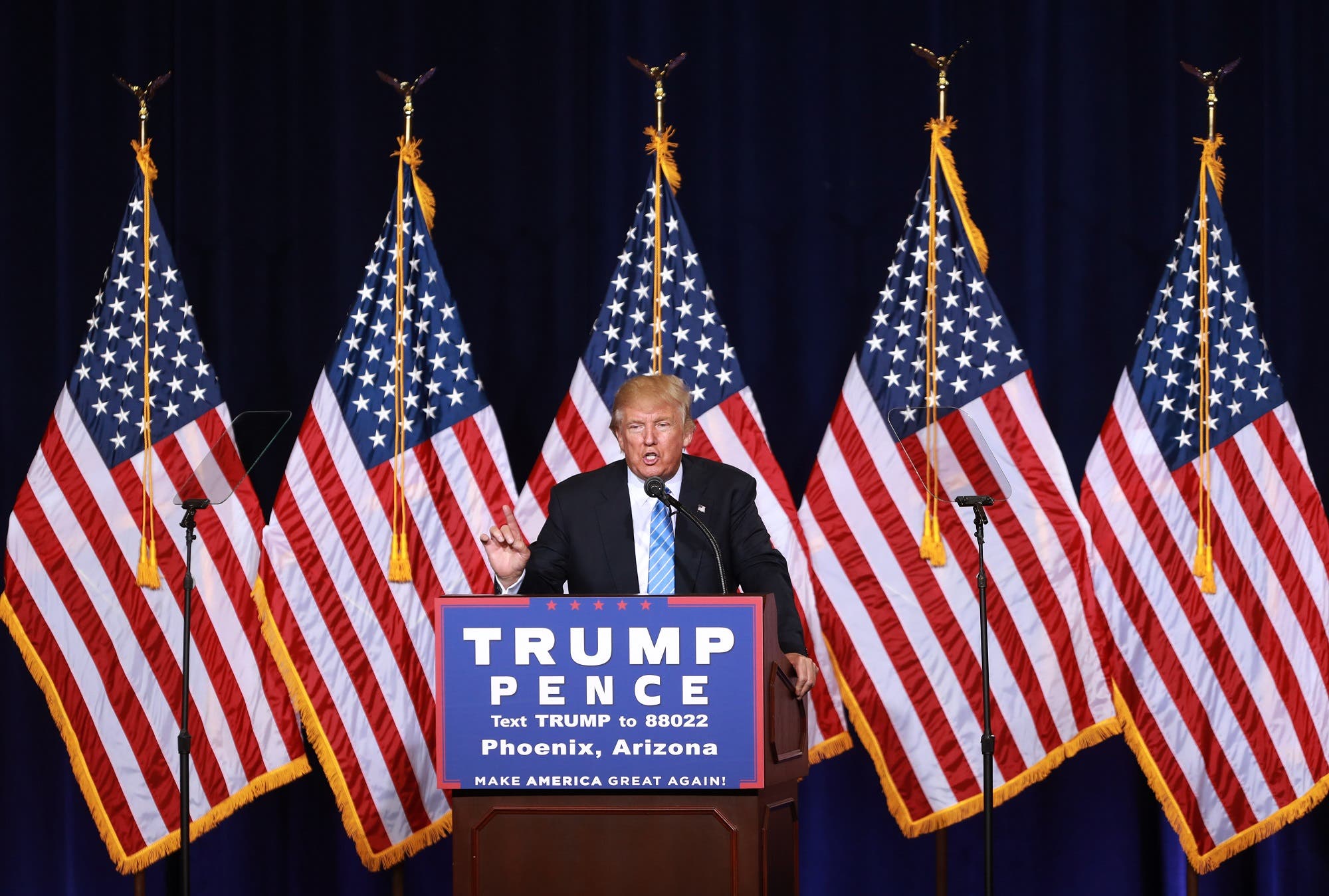 Trump unveils his 10-point plan to crack down on illegal immigration during a campaign event in Phoenix, Arizona, on August 31, 2016. (AFP)
