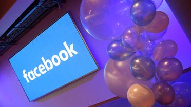 Balloons are seen in front of a logo at Facebook’s headquarters in London on December 4, 2017. (Reuters)