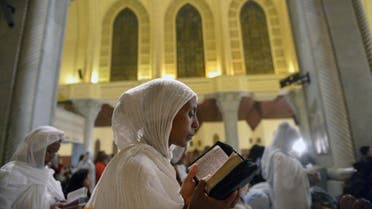 Ethiopian Christian Orthodox women attend an Easter mass at the Saint Mark’s Cathedral, in Cairo’s al-Abbassiya district on April 15, 2017. (AFP)