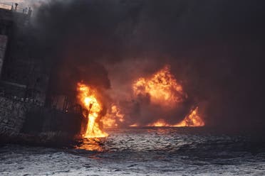 An Iranian oil tanker burst into flames from end to end and sank on January 14, eight days after it caught fire following a collision with a cargo ship off China. (AFP)
