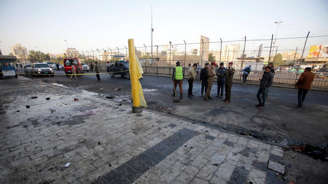 Iraqi security forces inspect the site of a bomb attack in Baghdad on January 15, 2018. (Reuters)