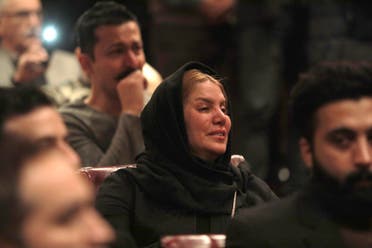 An Iranian relative of the oil Tanker crewmen, who were aboard it when it collided with a cargo ship off China eight days ago, reacts inside Iran's International Oil Tanker Central building in the capital Tehran. (AFP)