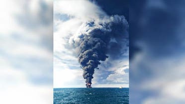 Smokes and flames engulf the burning Iranian oil tanker Sanchi in the East China Sea. (AP)