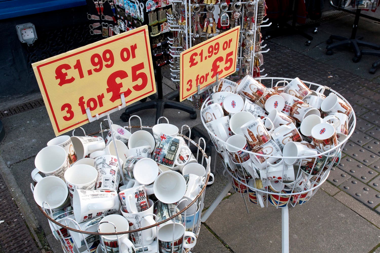 London-themed souvenir mugs are pictured for sale outside a gift shop in Windsor, west of London on December 8, 2017. (AFP)