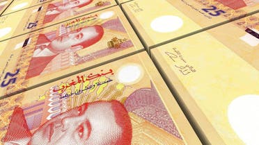 Moroccan dirhams bills stacks background. (Shutterstock)