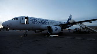 At least 20 dead as clashes shut airport in Libyan capital