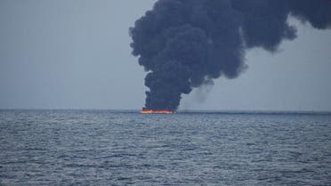 Flames and smoke from the Iranian oil tanker Sanchi is seen in the East China Sea, on January 15, 2018. (Reuters)