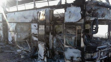 A handout picture provided by the Kazakh emergency situations ministry on January 18, 2018 shows the charred bus in the city of Aktobe. (AFP)