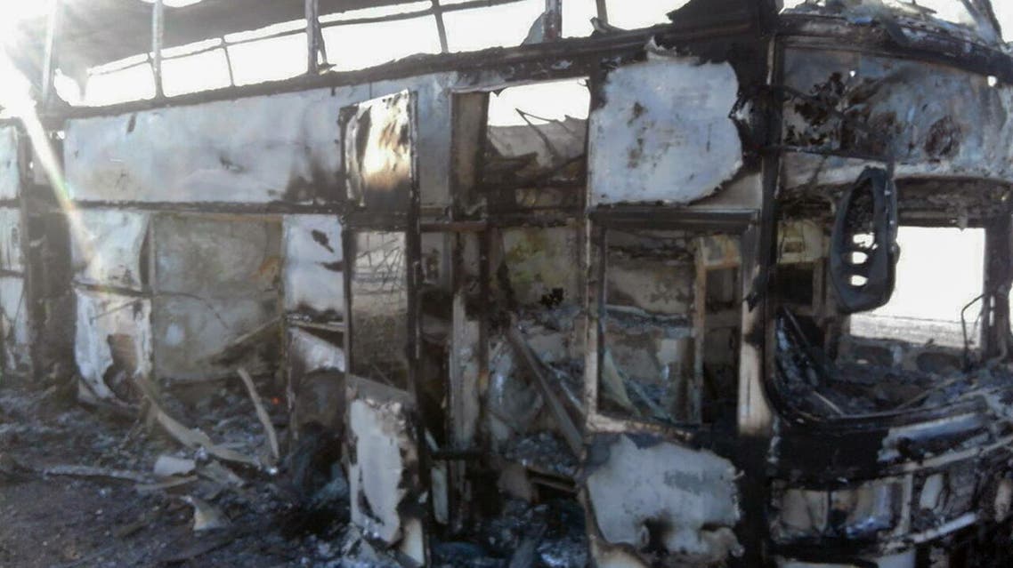 A handout picture provided by the Kazakh emergency situations ministry on January 18, 2018 shows the charred bus in the city of Aktobe. (AFP)