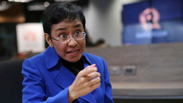 Rappler CEO and Executive Editor Maria Ressa gestures during an interview at their office in metropolitan Manila. (AP)