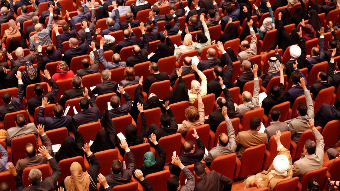 Members of the Iraqi parliament gather to vote on new government at the parliament headquarters in Baghdad on September 8, 2014. (Reuters)