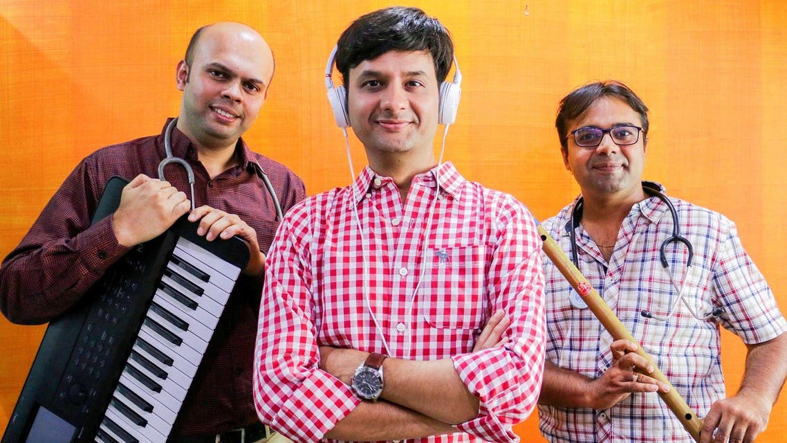 Dr Parth Mankad (extreme right), Dr Kedar Upadhyay (extreme left) and Dhvanit Thaker have set up Euphonious Healing Music Therapy Clinic and Research Centre in Ahmedabad. (Supplied)