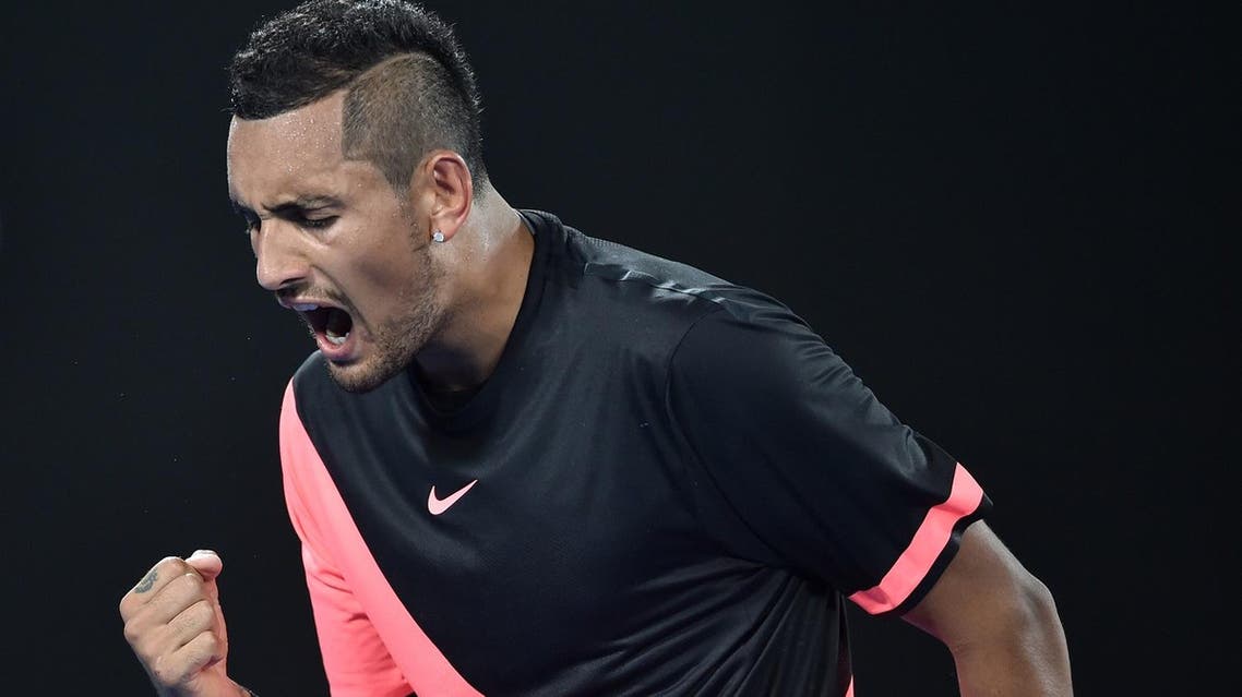Nick Kyrgios reacts after a point against Grigor Dimitrov during their men’s singles fourth round match on day seven of the Australian Open in Melbourne on January 21, 2018. (AFP)