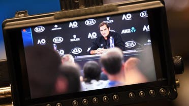 Switzerland's Roger Federer is seen on a viewfinder during a press conference ahead of the Australian Open tennis tournament. (AFP)