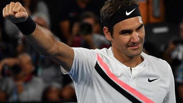 Roger Federer celebrates beating Tomas Berdych in their men’s singles quarter-finals match on day 10 of the Australian Open in Melbourne on January 24, 2018. (AFP)