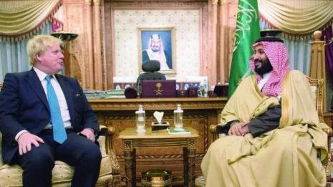 محمد بن سلمان وبوريس جونسون في صورة أرشيفية