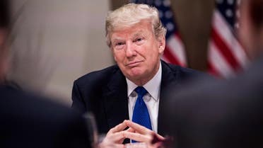 US President Donald Trump listens to a speaker during a working dinner with European business leaders during the World Economic Forum. (AFP)