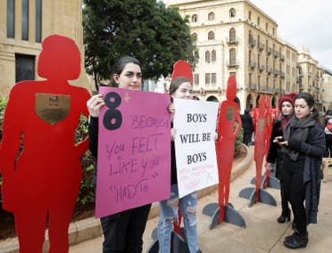 A file photo shows figures representing women killed by male relatives in Lebanon. (AFP)