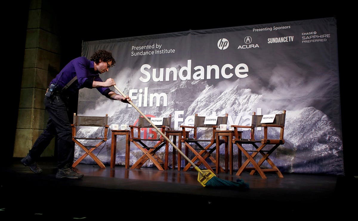 Kane prepares the stage at an opening day news conference for the Sundance Film Festival in Park City Utah. (Reuters)