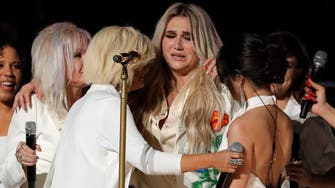 Kesha sings her heart out at Grammys in fierce anti-abuse statement 