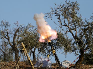 Turkey-backed Free Syrian Army fighters fire a mortar in Barsaya mountain, northeast of Afrin, Syria January 28, 2018. REUTERS/