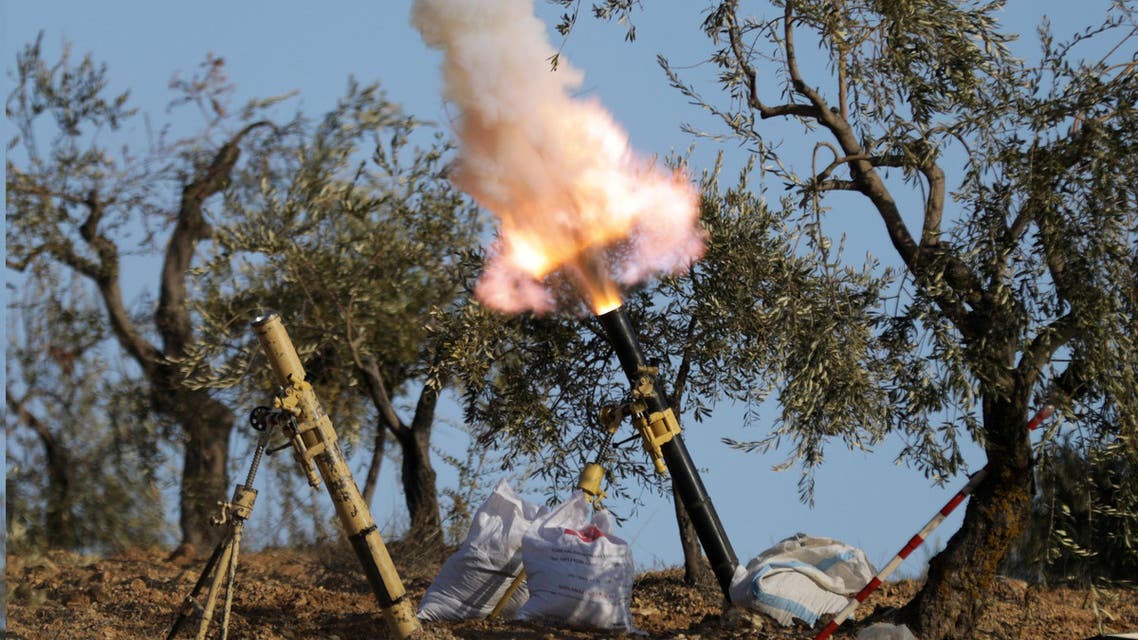 Turkey-backed Free Syrian Army fighters fire a mortar in Barsaya mountain, northeast of Afrin, Syria January 28, 2018. REUTERS/
