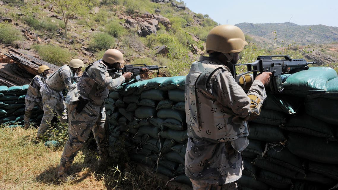 Saudi border guards keep watch along the border with Yemen in the al-Khubah area in the southern Jizan province on October 3, 2017. The post in al-Khubah, a deserted village framed by barren mountain ridges, is one of several border guard bases the Huthi-rebels have targeted in cross-border raids since a Saudi-led coalition began its military intervention in Yemen in 2015. Fayez Nureldine / AFP
